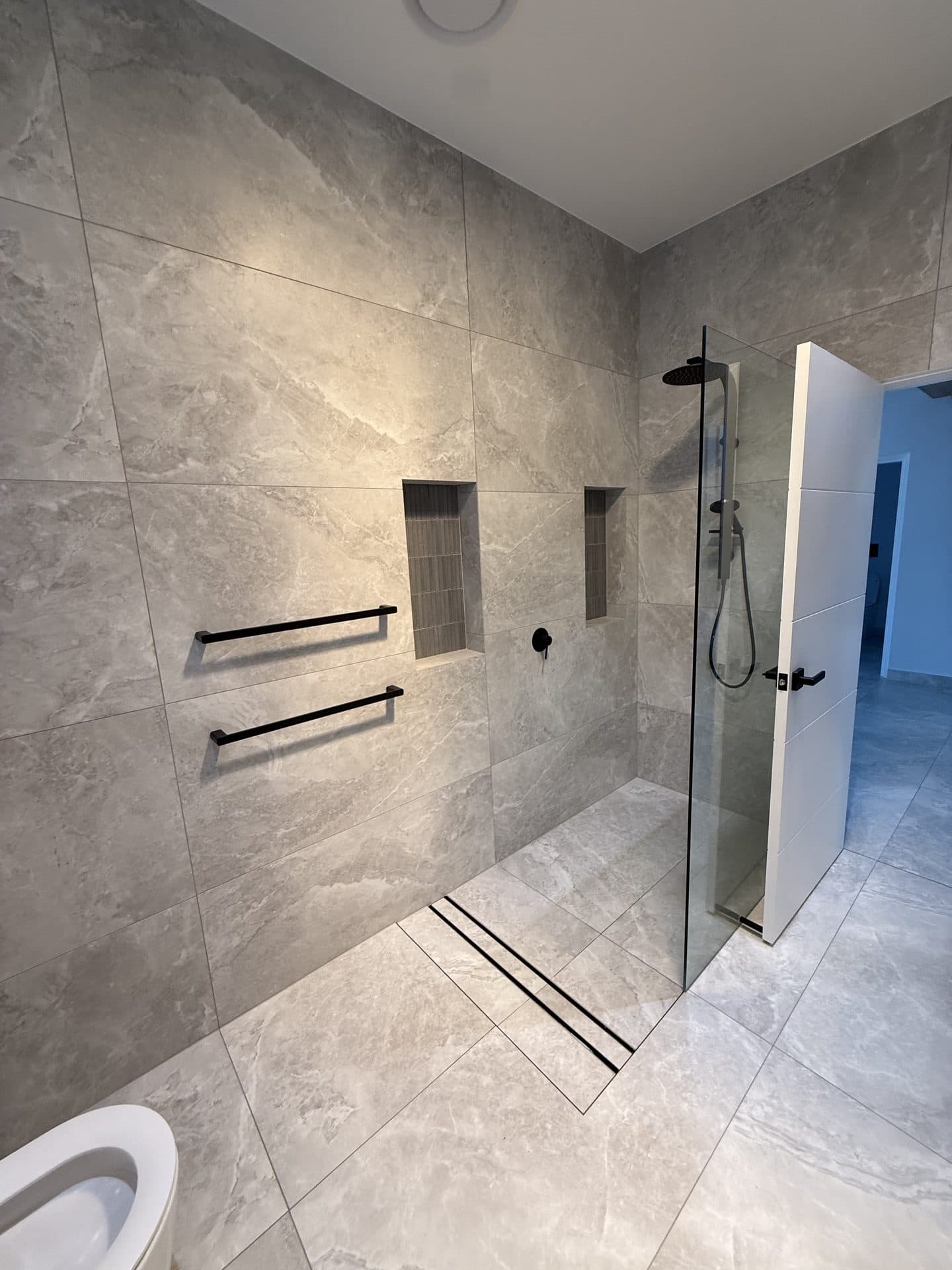 12 Questions to Ask Before Hiring a Sydney Bathroom Renovator - feature image